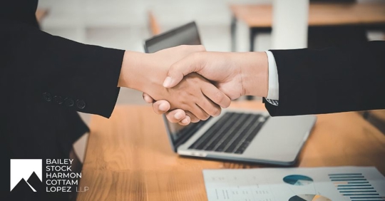 two people shaking hands